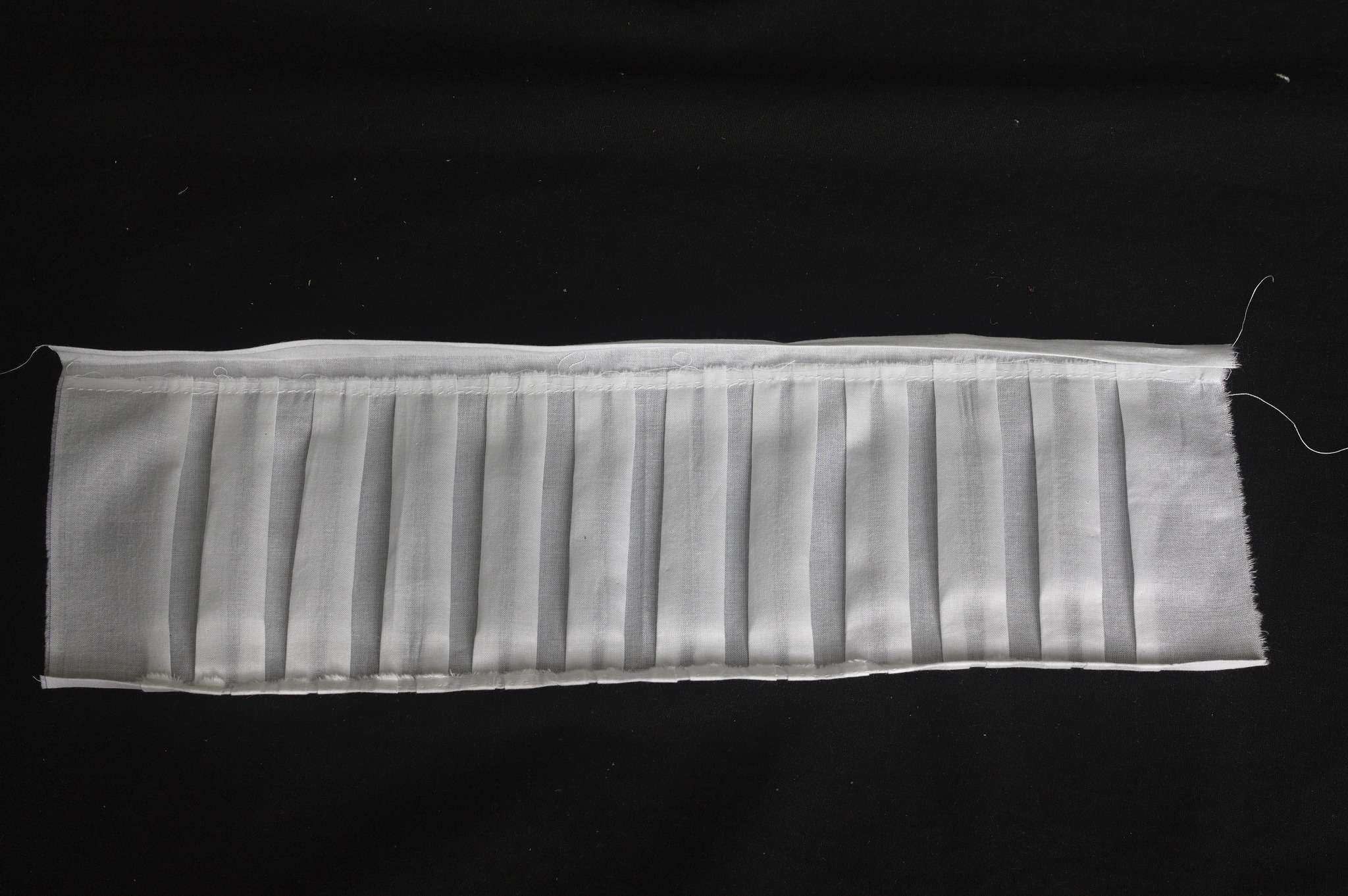../../../_images/0504-pressing_sleeve_hems.jpg